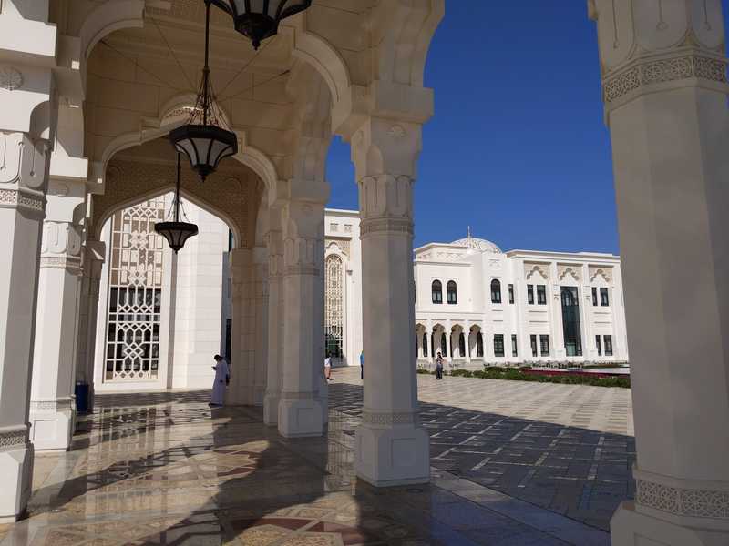 The blindingly white facade of Qasr Al-Watan.